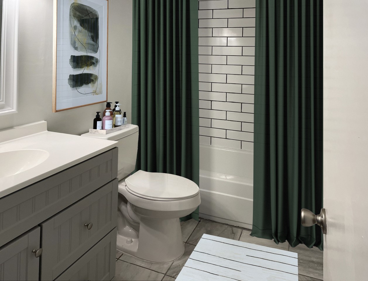 901 Midtown Rentals Bathroom with green shower curtain